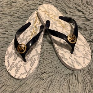 Michael Kors Navy blue and white flip flops